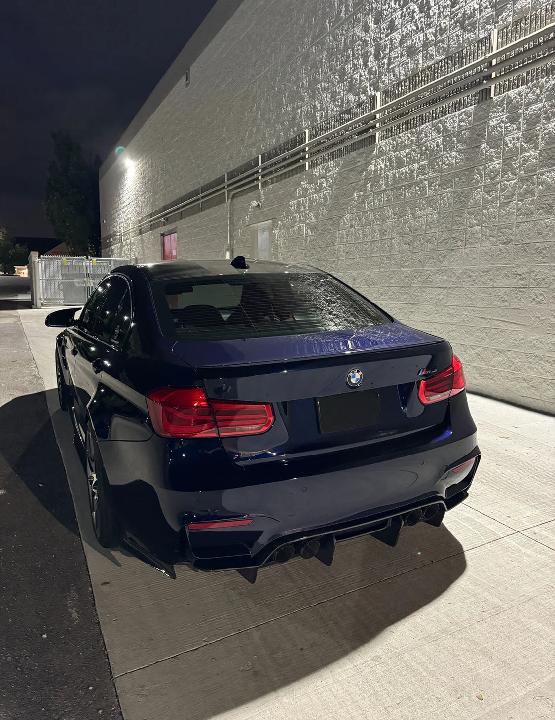 Stealth Blackout License Plate Cover in operation demonstrating the blackout feature from different angles
