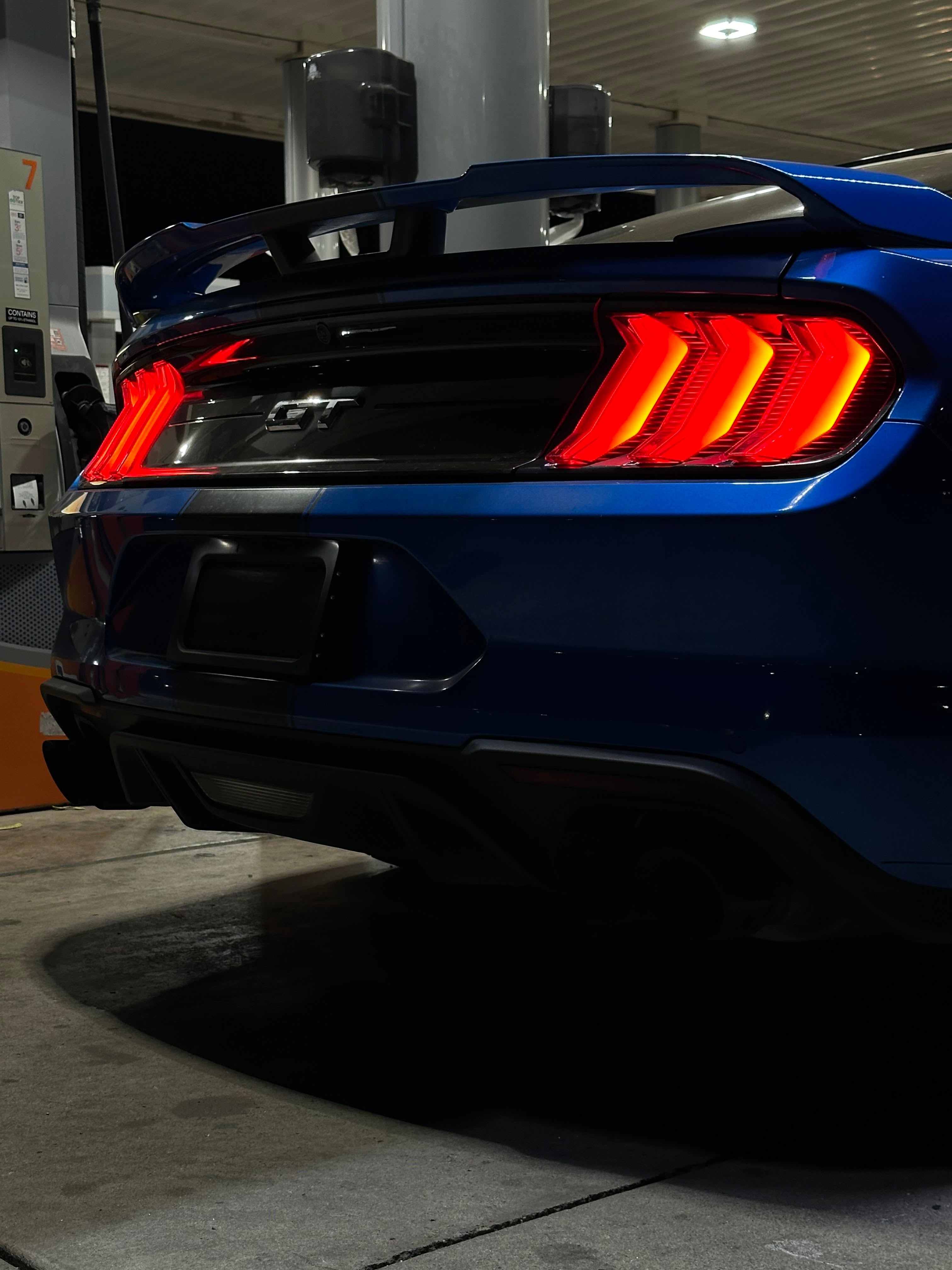 picture of a motorized stealth license plate curtain on a Mustang GT