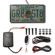 Stealth Blackout License Plate Cover installed on a vehicle demonstrating how it looks when activated